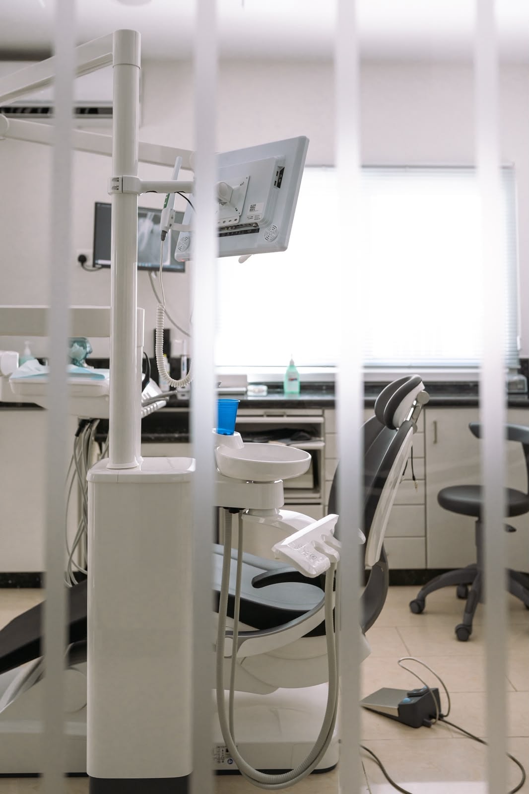 A treatment unit and its screen, behind the blinds